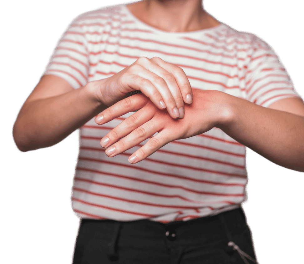 mid section of young woman having pain in hand mid section of young woman having pain in hand